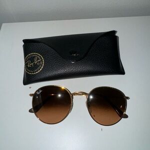gold rimmed brown tint Ray Bans. Lightly used, very good condition. No scratches